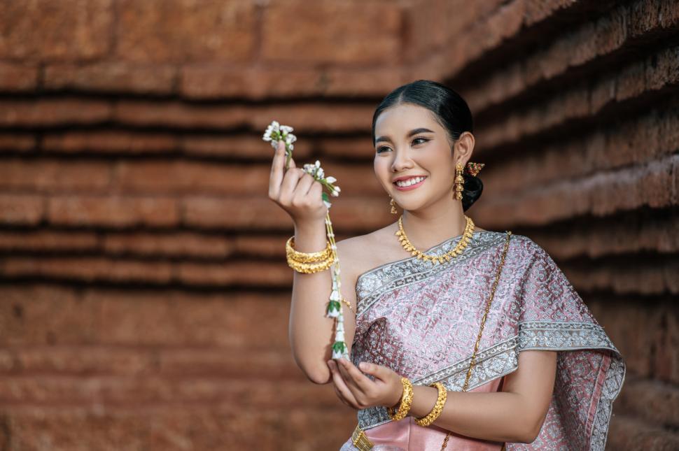 Free Image of Asian charming woman wearing typical Thai dress identity culture 