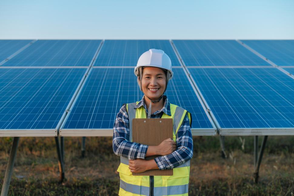 Free Image of Young inspector female checking operation photovoltaic solar panel 