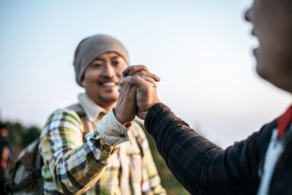Free Image of Close-up of Teamwork helping hand trust help 