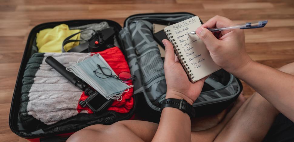 Free Image of Close-up of man checks the checklist 