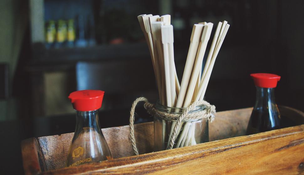 Free Image of Condiments and utensils at a dining table setting 