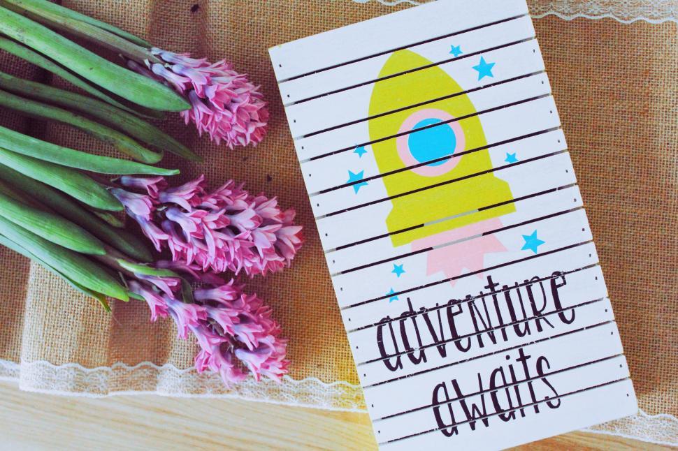 Free Image of Adventure awaits in a colorful design with flowers 