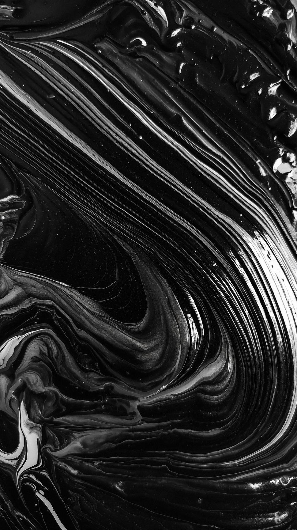 Free Image of Black and white swirling abstract art with dynamic textures 