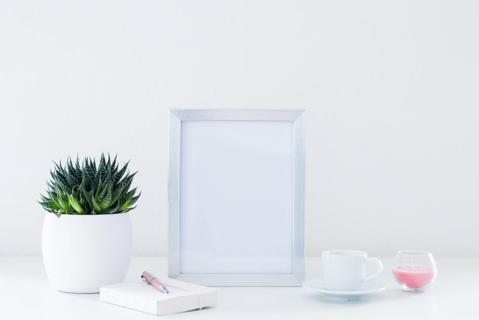 Free Image of Modern desk arrangement featuring minimalist decor elements 