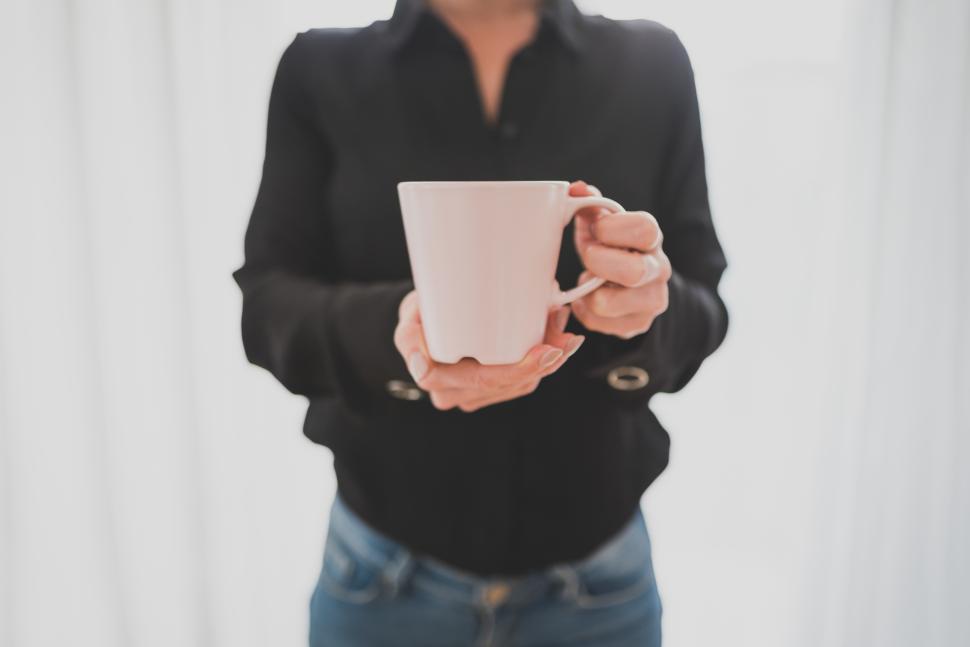 Free Image of Enjoying a warm drink at home during the morning 