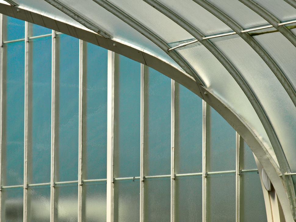 Free Image of Modern architectural design showcased in a glass building structure 