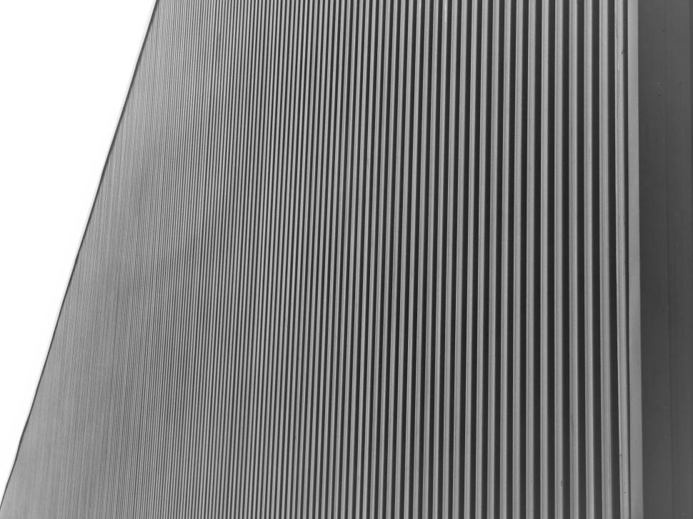 Free Image of Vertical lines create texture on modern building facade 
