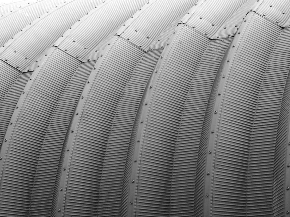 Free Image of Curved metallic lines showcase intricate design at modern architecture site 
