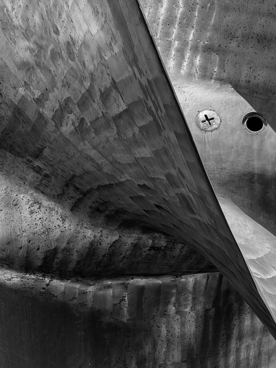 Free Image of Black and white photo, detail of large ship propeller 