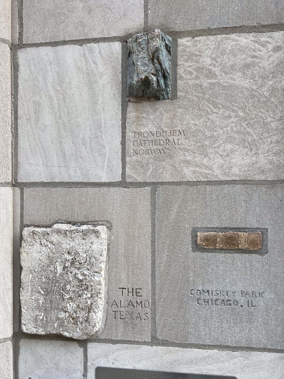 Free Image of Unique Chicago Tribune building wall with historical plaques and fragments from diverse places 