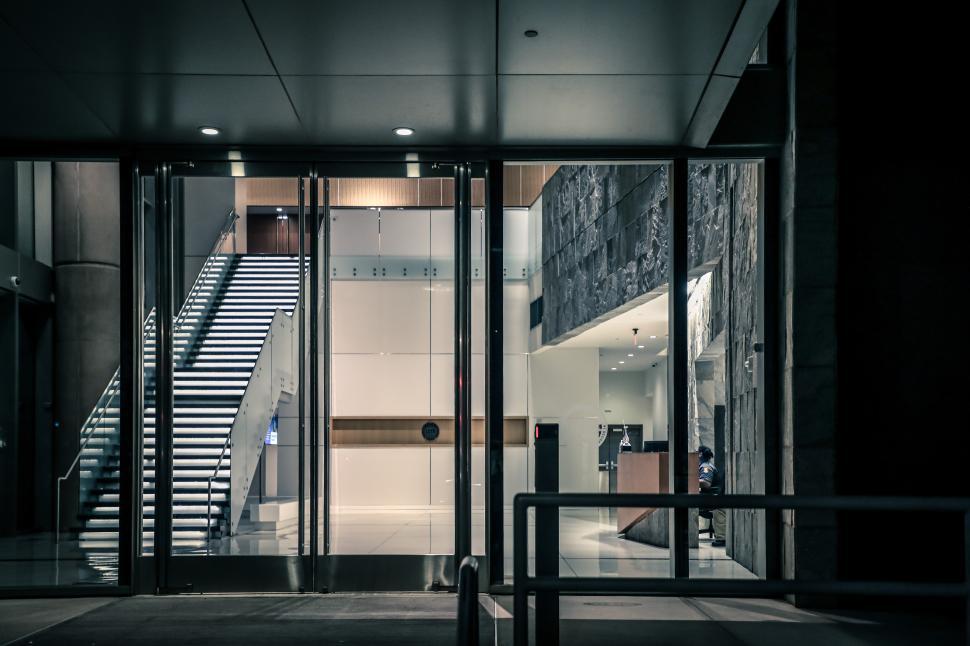 Free Image of Modern interior of a commercial building with a stylish entrance and staircase 