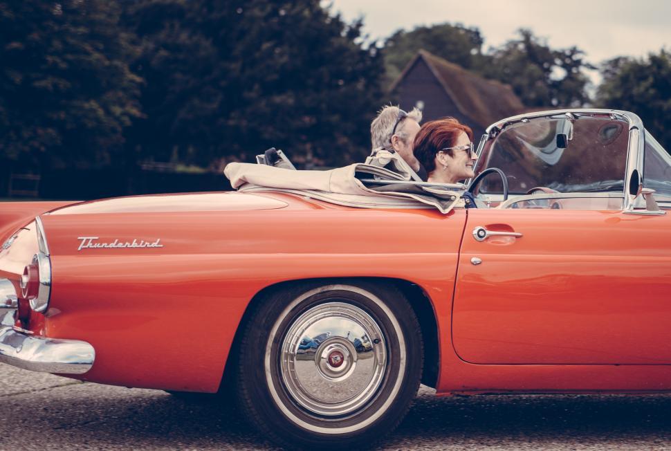 Free Image of Classic car journey with friends on a sunny day 
