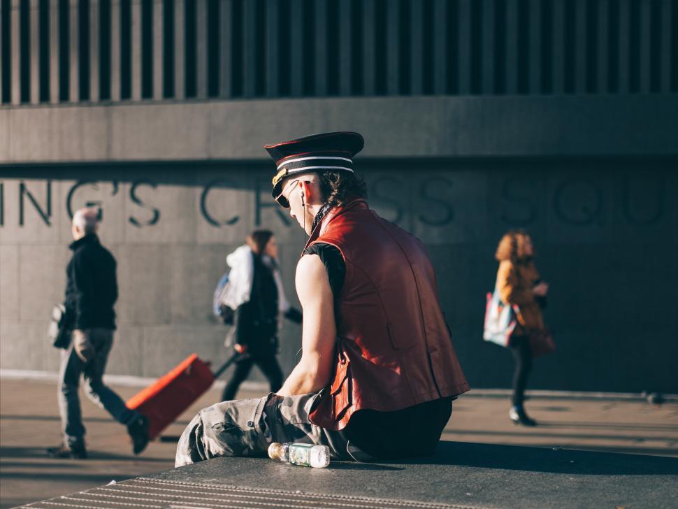 Free Image of Street performer dressed in vintage attire at Kings Cross London 