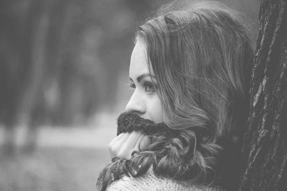 Free Image of Woman in sweater enjoying nature during autumn 