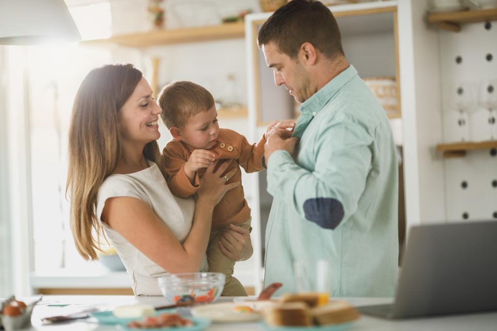 Free Image of Family enjoys quality time together in a modern kitchen 