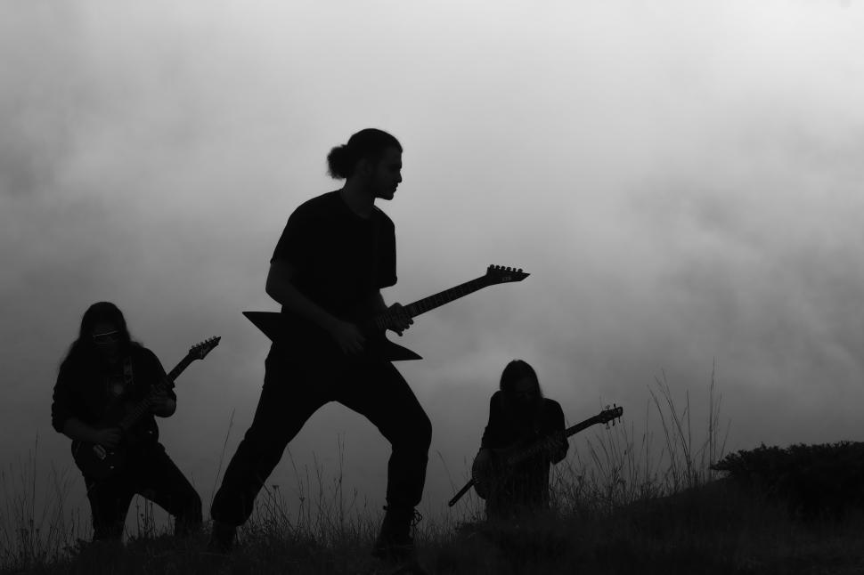 Free Image of A rock music artist performing - Iran-Mortaz band  