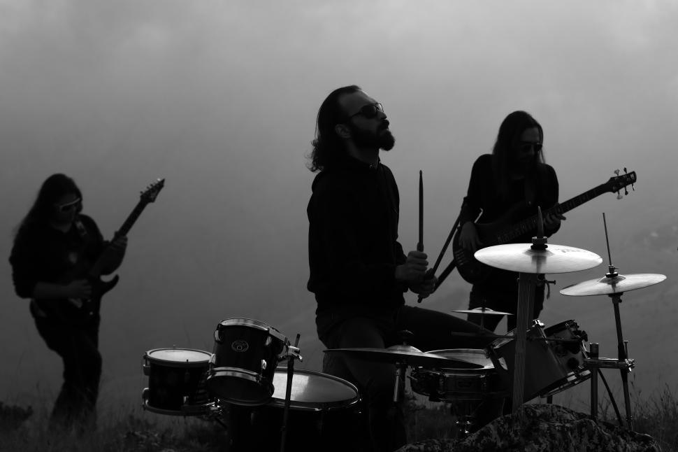 Free Image of A rock music artist performing - Iran-Mortaz band  