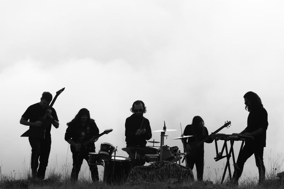 Free Image of A rock music artist performing - Iran-Mortaz band  