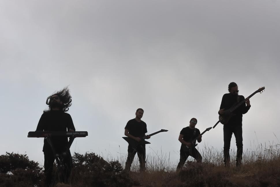 Free Image of A rock music artist performing - Iran-Mortaz band  