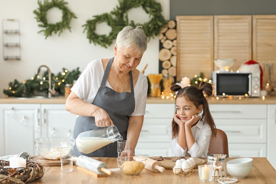 Free Image of Cooking together in a cozy kitchen during holiday season 