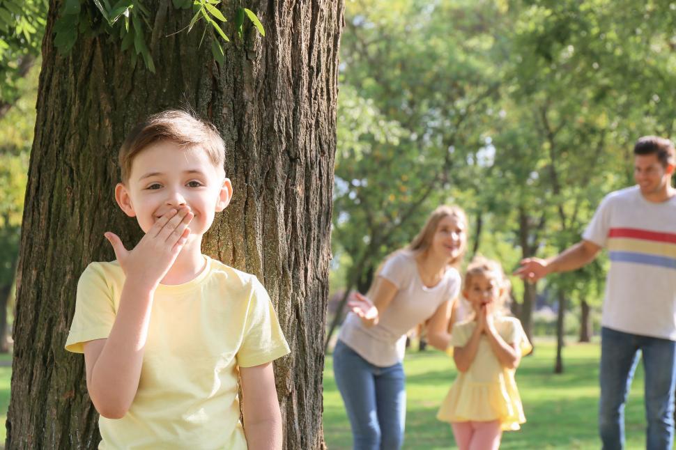 Free Image of Happy family enjoying fun moments in the park together 