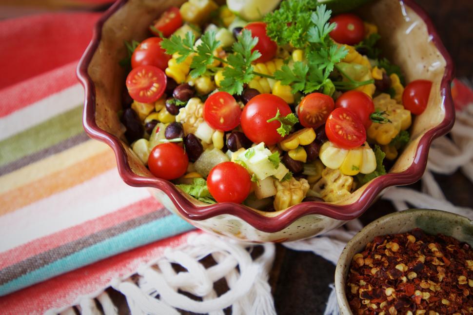 Free Image of Delicious salad with fresh vegetables in a colorful bowl 