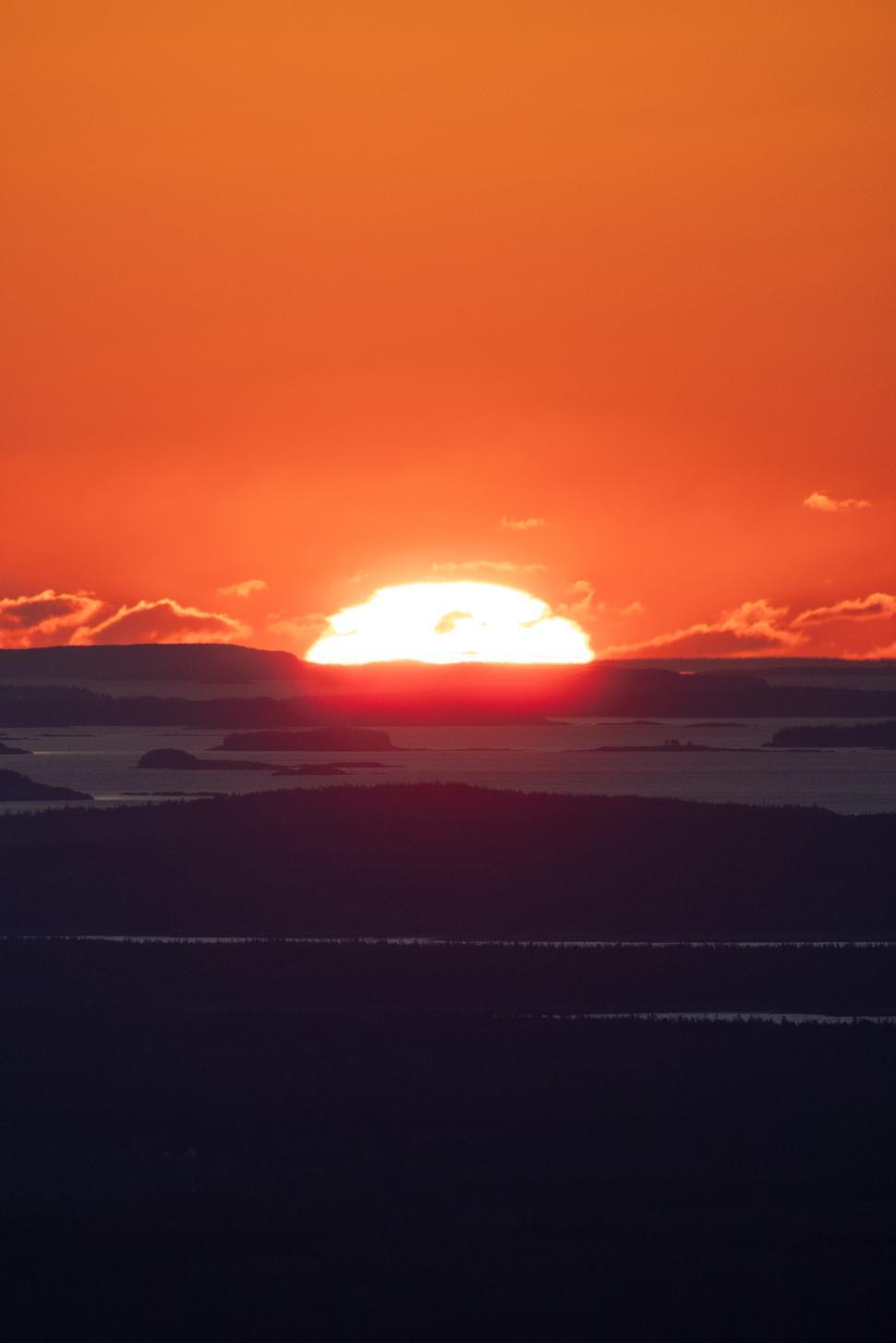 Free Image of Sunset over the horizon with vibrant orange colors 