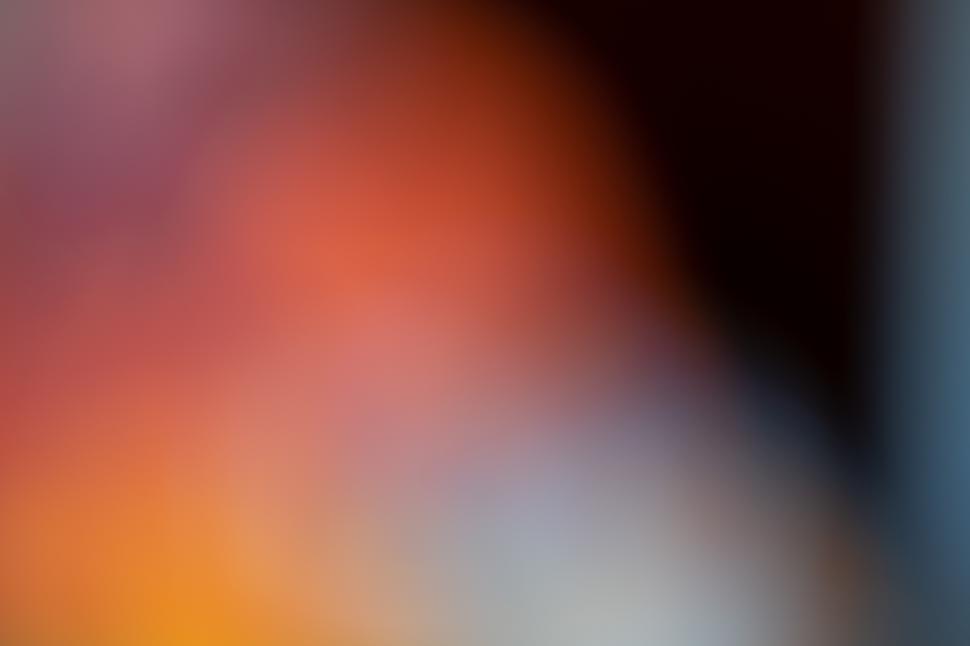 Free Image of Vibrant colors blend in abstract art display at a local gallery event 