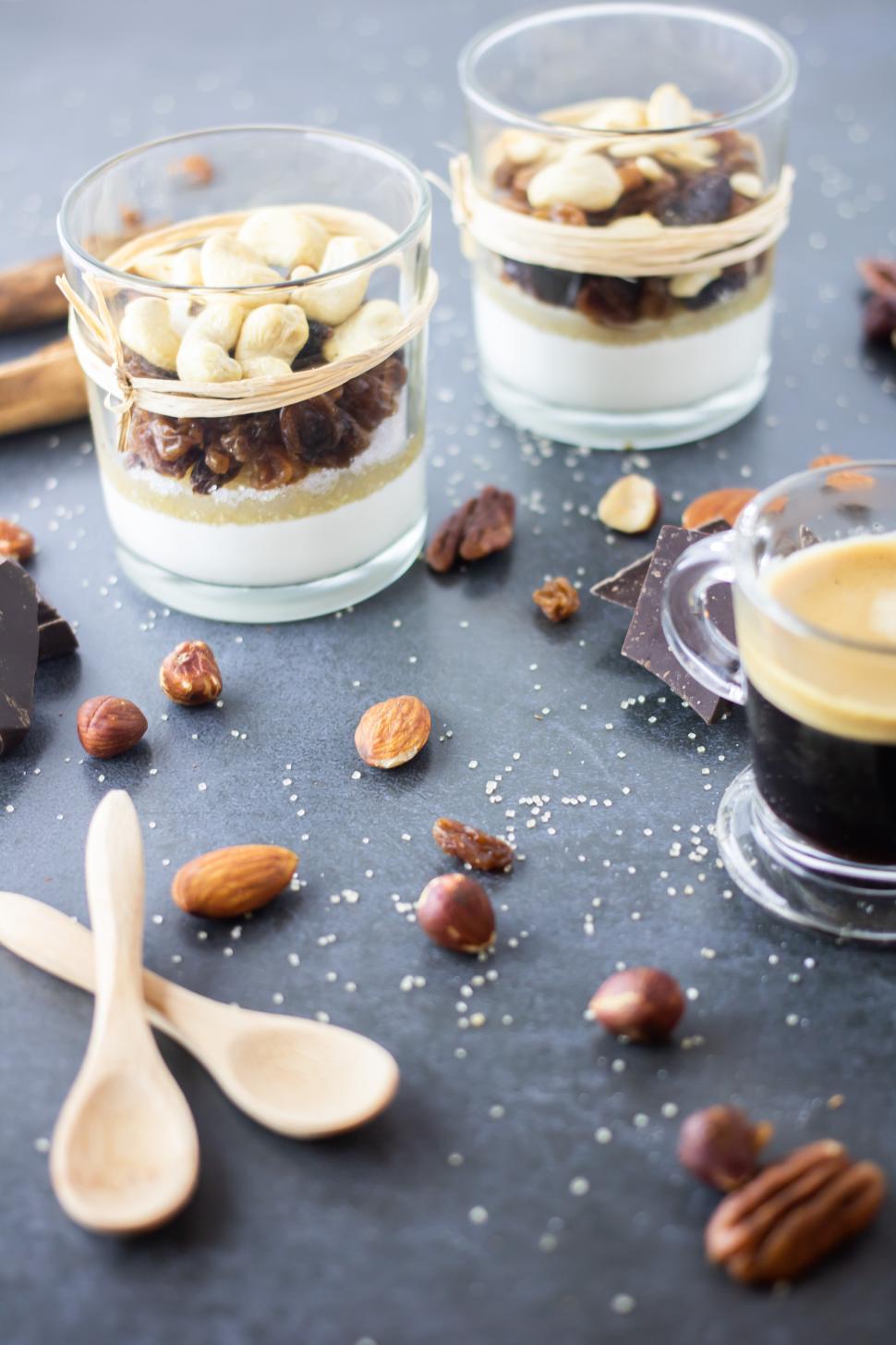 Free Image of Delicious desserts and coffee on a dark table setting 