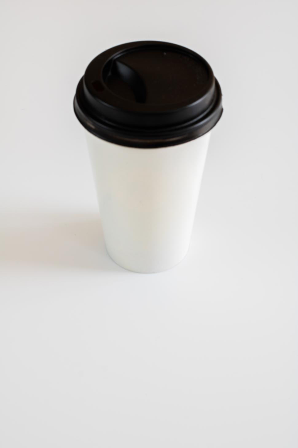 Free Image of Hot beverage cup on a plain white surface 