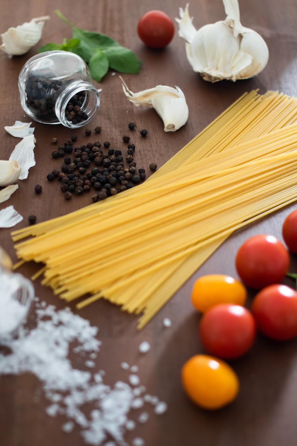 Free Image of Ingredients for preparing a delicious pasta dish 
