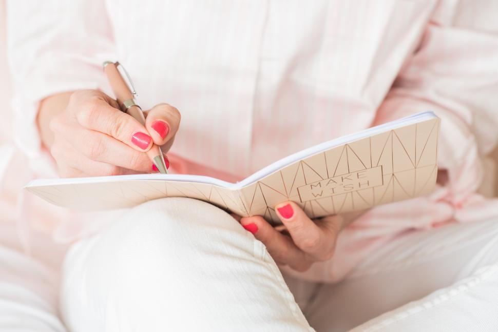 Free Image of Writing down wishes in a cozy space 