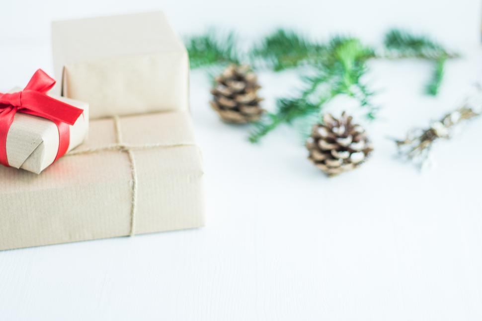 Free Image of Holiday gift boxes with decorations for festive season 