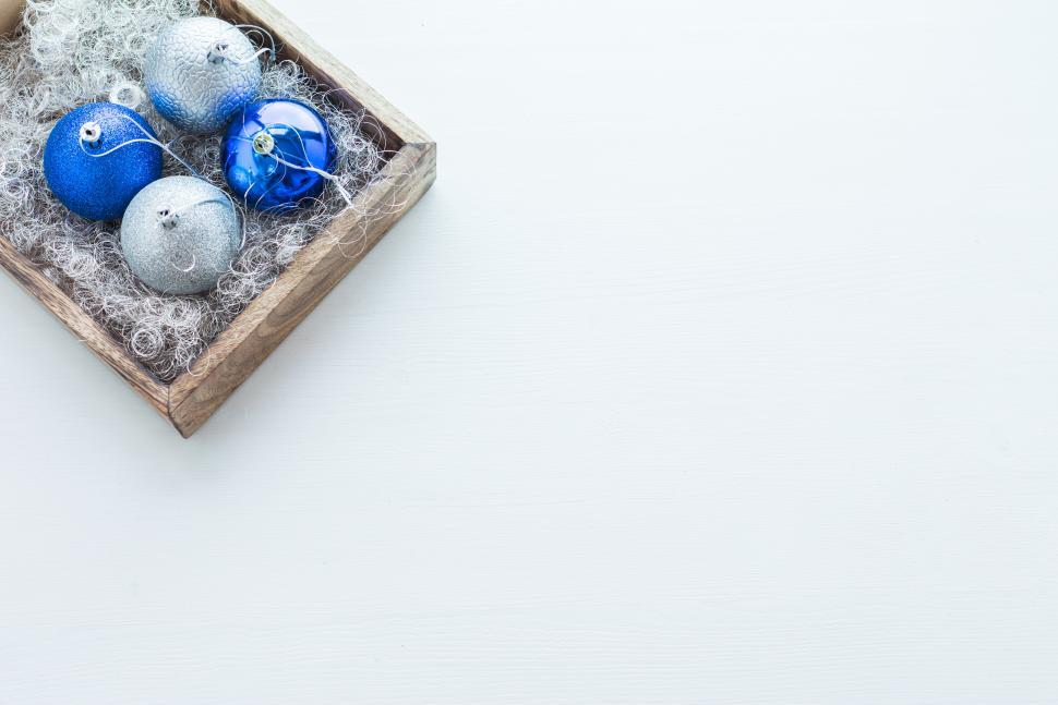 Free Image of Decorative ornaments in a wooden box for holidays 