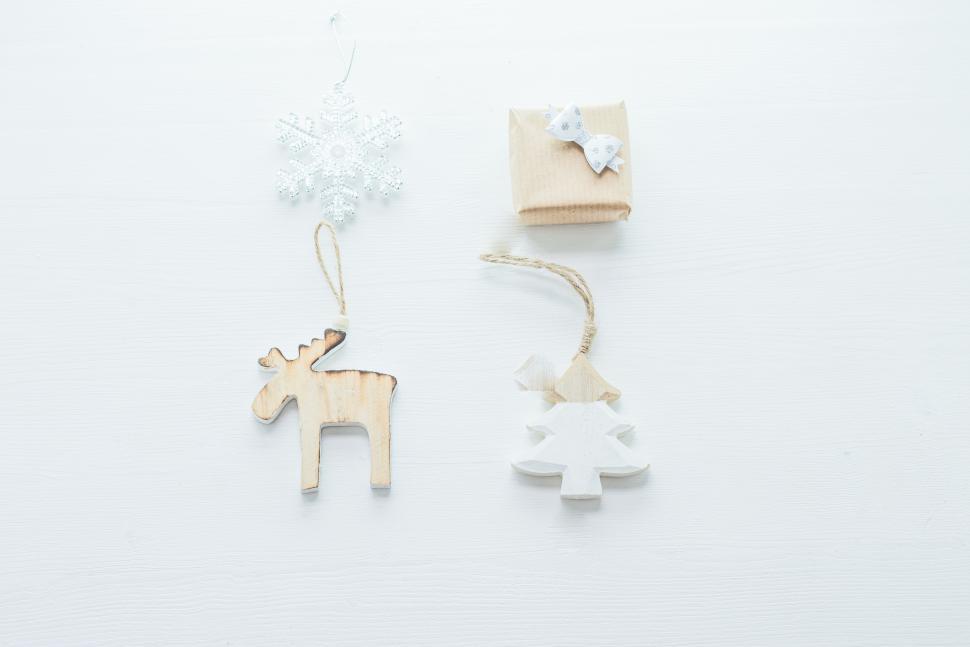 Free Image of Wooden Christmas ornaments on white surface 