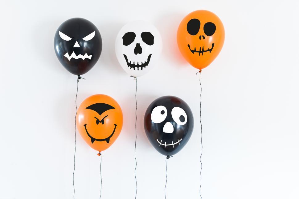 Free Image of Fun Halloween balloons decorate a party space 