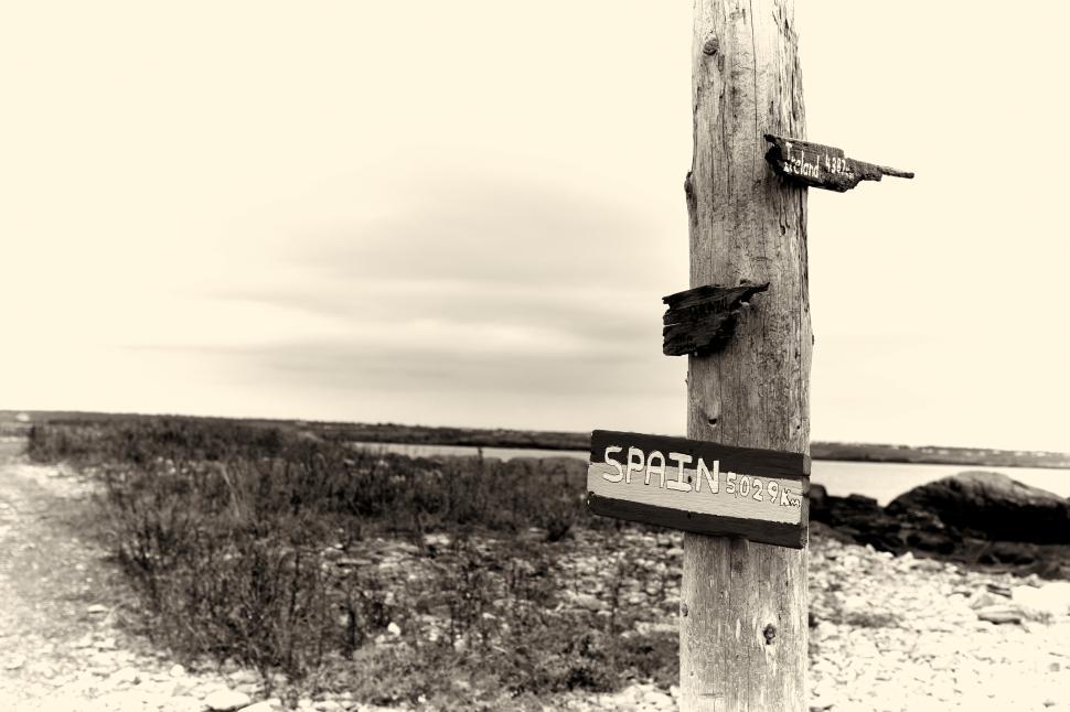 Free Image of Signpost indicating direction to Spain along a coastal path 