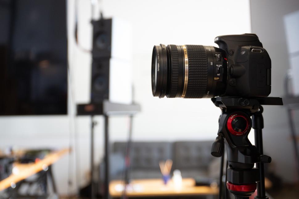 Free Image of Camera on tripod in a modern studio setting 