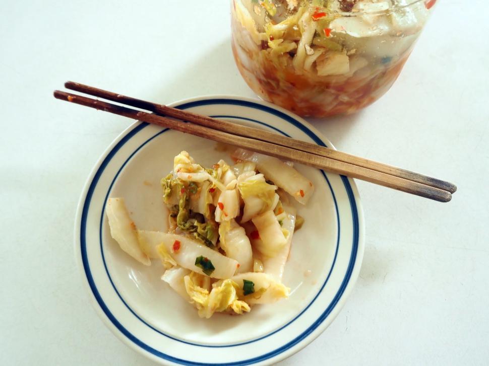 Free Image of Trying Homemade Cabbage Kimchi 