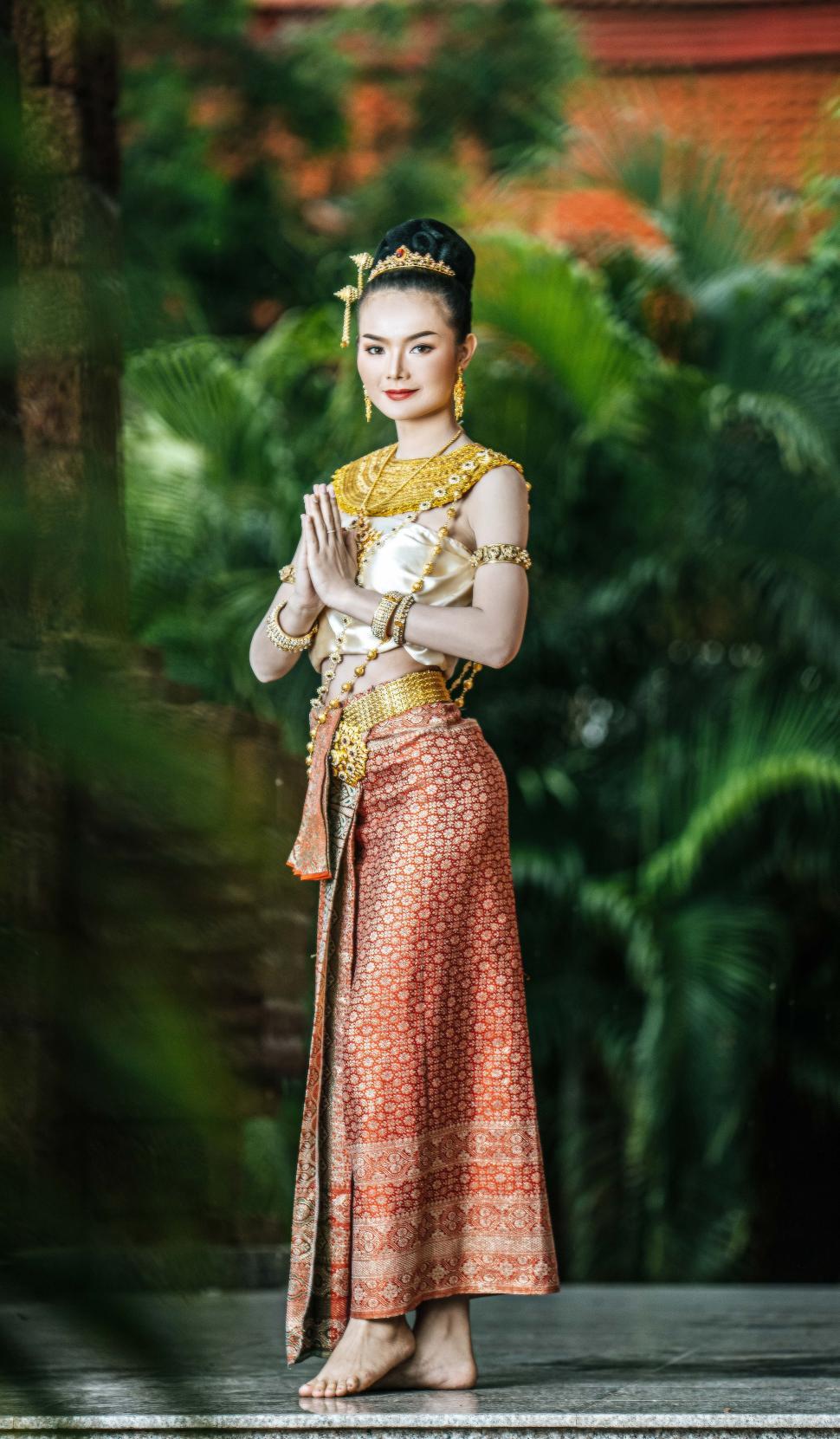 Free Image of Charming Thai woman in Beautiful traditional dress at archaeological site 