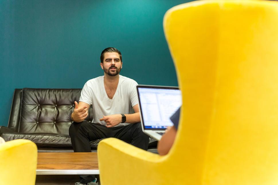 Free Image of Discussion in a vibrant workspace during daytime 