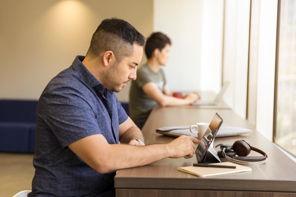 Free Image of Young professionals working quietly in a modern office 