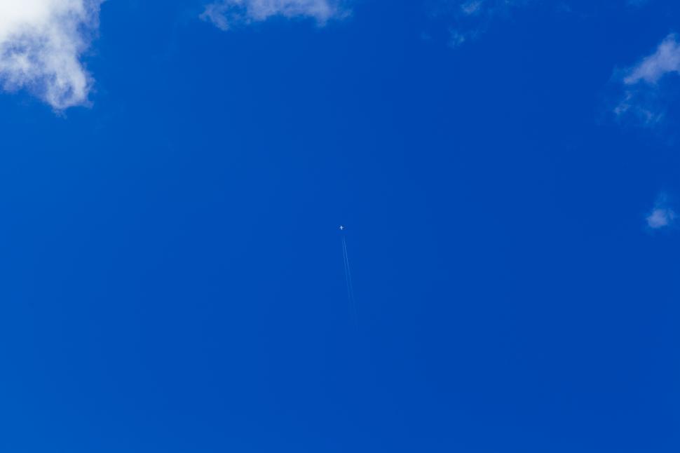 Free Image of Rocket launches into clear blue sky at sunny day 