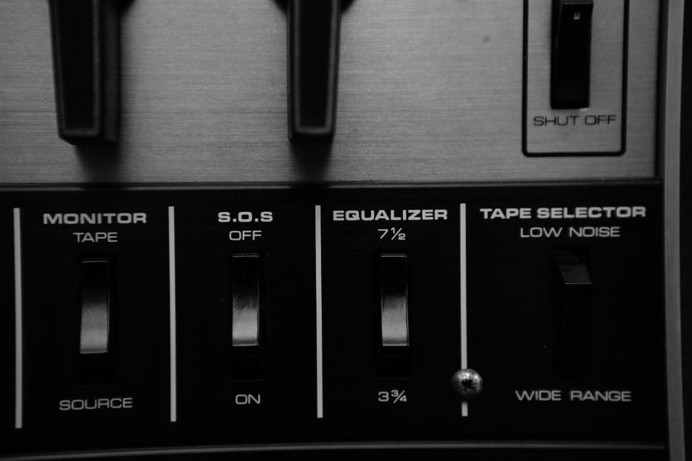 Free Image of Settings on a vintage audio mixer in black and white 