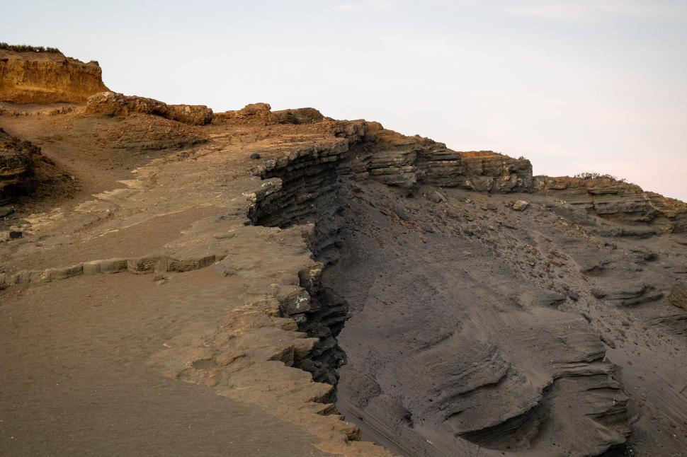 Free Image of Unique geological formations reveal contrasting textures in landscape 