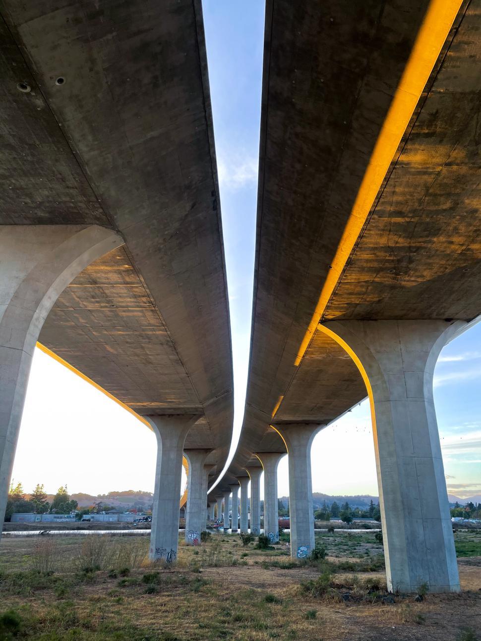 Free Image of Unique perspective of a modern overpass at sunset 