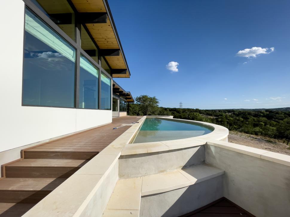 Free Image of Luxurious modern house with stunning views and pool in nature 