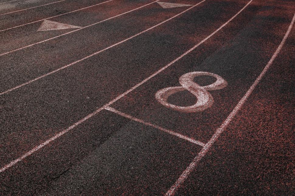 Free Image of Running track with lane markings ready for athletes to compete 