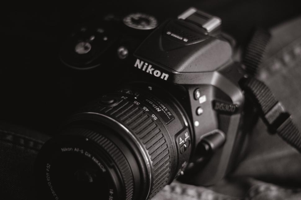 Free Image of Capturing moments with a digital camera on a dark surface 