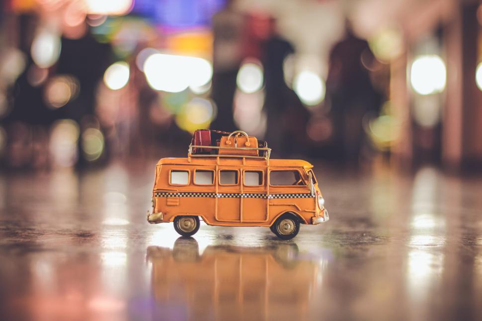 Free Image of Vintage toy van on display at a market in the evening light 